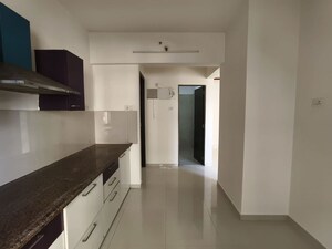 Kitchen in 2 BHK Apartment at Puranik Rumah Bali, Ghodbunder Road – for Rent