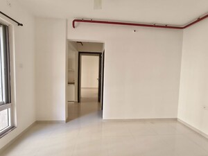 Living Room in 2 BHK Apartment at Puranik Rumah Bali, Ghodbunder Road – for Rent