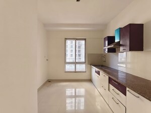 Kitchen in 2 BHK Apartment at Puranik Rumah Bali, Ghodbunder Road – for Rent