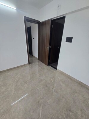 Room in 2 BHK Apartment at Skyrise Sparkle, Dhanori – for Rent