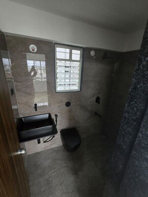Bathroom in 2 BHK Apartment at Skyrise Sparkle, Dhanori – for Rent