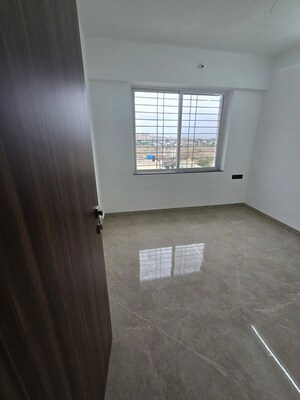 Room in 2 BHK Apartment at Skyrise Sparkle, Dhanori – for Rent
