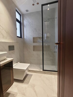 Bathroom in 4 BHK Builder Floor at Green Park Extension – for Sale