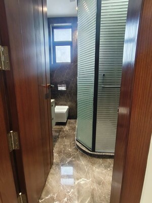 Bathroom in 4 BHK Builder Floor at Green Park Extension – for Sale