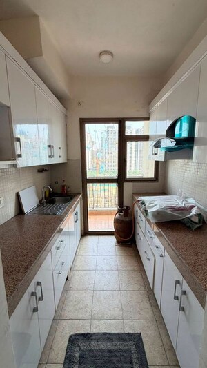 Kitchen in 2 BHK Apartment at Paramount Emotions, Sector 1 Greater Noida – for Rent