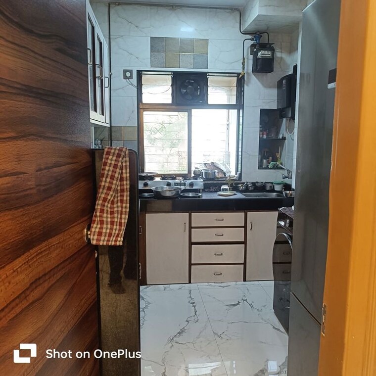 Kitchen, jyoti-arch 2 Bedroom 700 Sq.Ft. Apartment In Kandivali West Mumbai 10489469