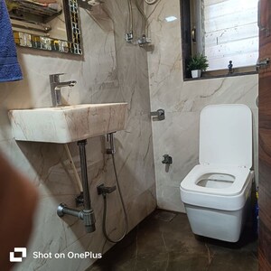 Bathroom in 2 BHK Apartment at Jyoti Arch, Kandivali West – for Sale