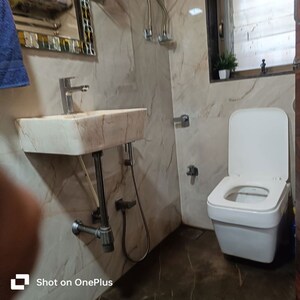 Bathroom in 2 BHK Apartment at Jyoti Arch, Kandivali West – for Sale