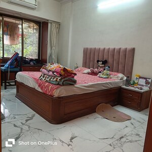 Bedroom in 2 BHK Apartment at Jyoti Arch, Kandivali West – for Sale