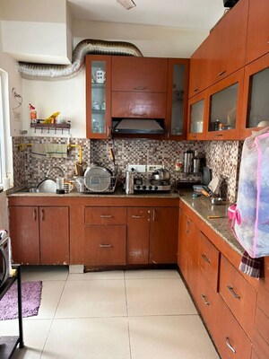Kitchen in 2 BHK Apartment at Amrapali Silicon City, Sector 76 – for Rent