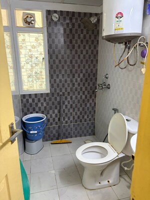 Bathroom in 2 BHK Apartment at Amrapali Silicon City, Sector 76 – for Rent