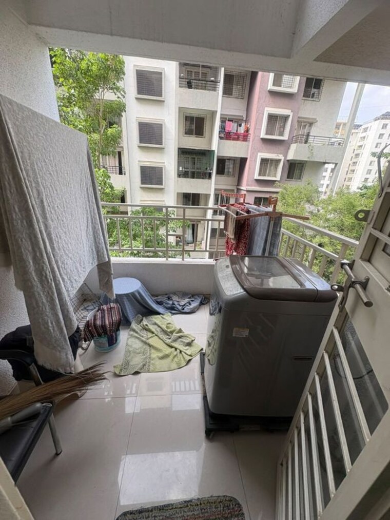 Balcony, mak-snehangan-residency 1 Bedroom 700 Sq.Ft. Apartment In Wakad Pune 10489632