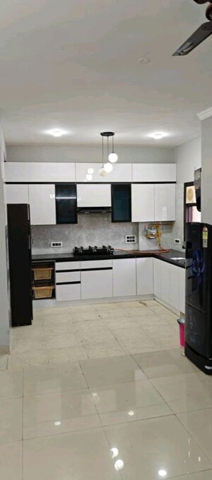 Kitchen in 3 BHK Apartment at Golf Gardenia, Alpha Ii Greater Noida – for Rent
