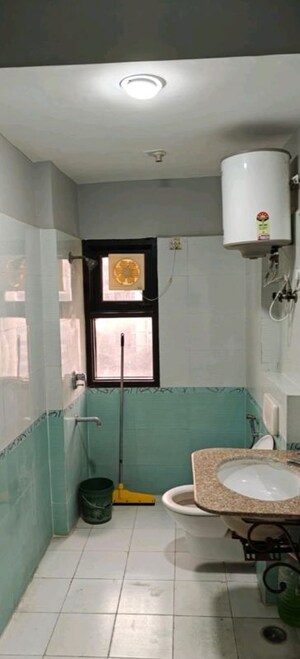 Bathroom in 3 BHK Apartment at Golf Gardenia, Alpha Ii Greater Noida – for Rent