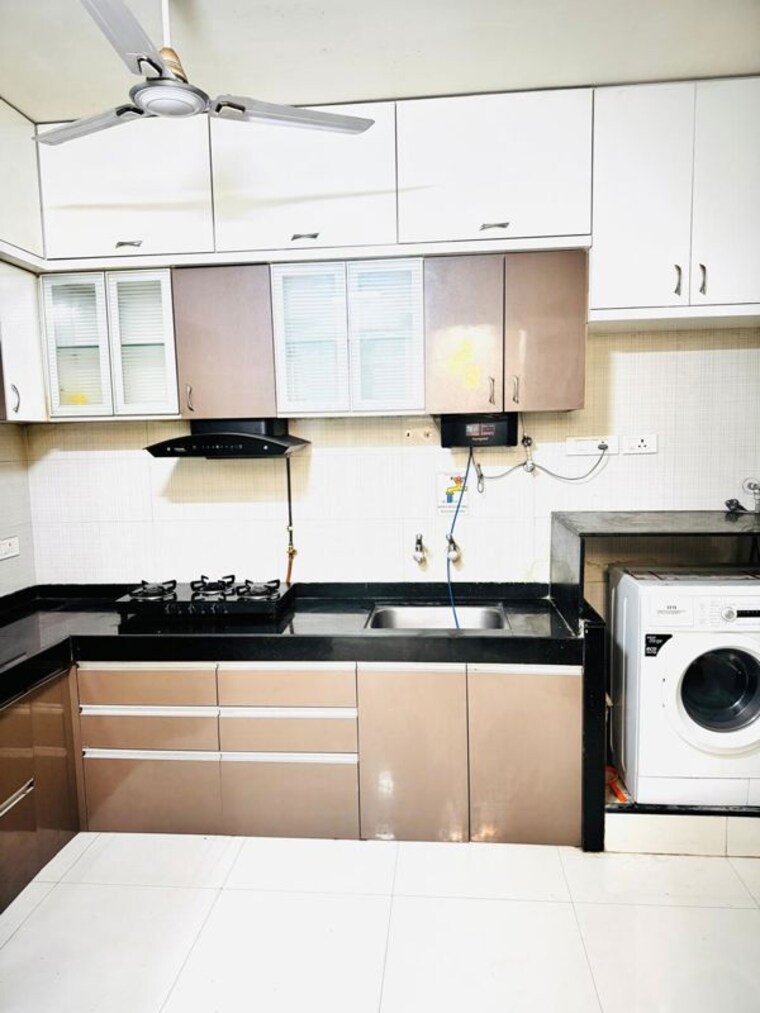 Kitchen, nyati-elysia 2 Bedroom 750 Sq.Ft. Apartment In Kharadi Pune 10489721