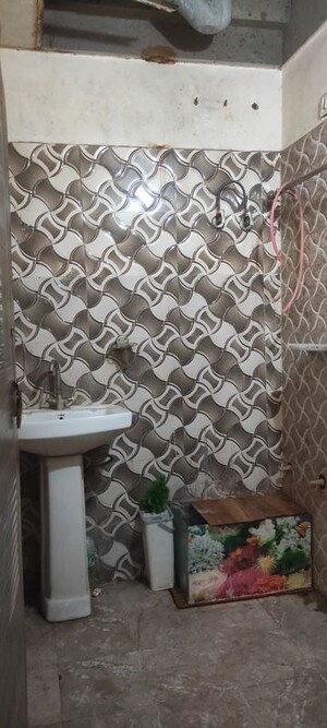 Bathroom in 1 BHK Builder Floor at Maan Heights, Gaur City 1 – for Rent