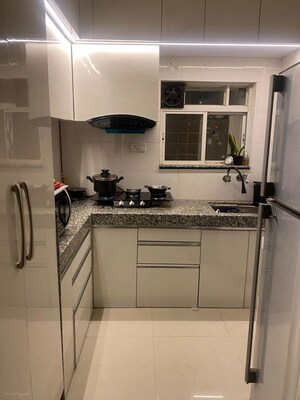 Kitchen in 2 BHK Apartment at Videocon Laxmi Narayan Krupa, Vile Parle West – for Rent