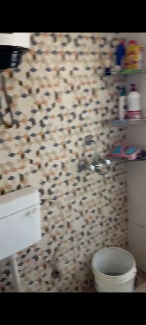 Bathroom in 1 BHK Apartment at Nilaya Greens, Raj Nagar Extension – for Rent