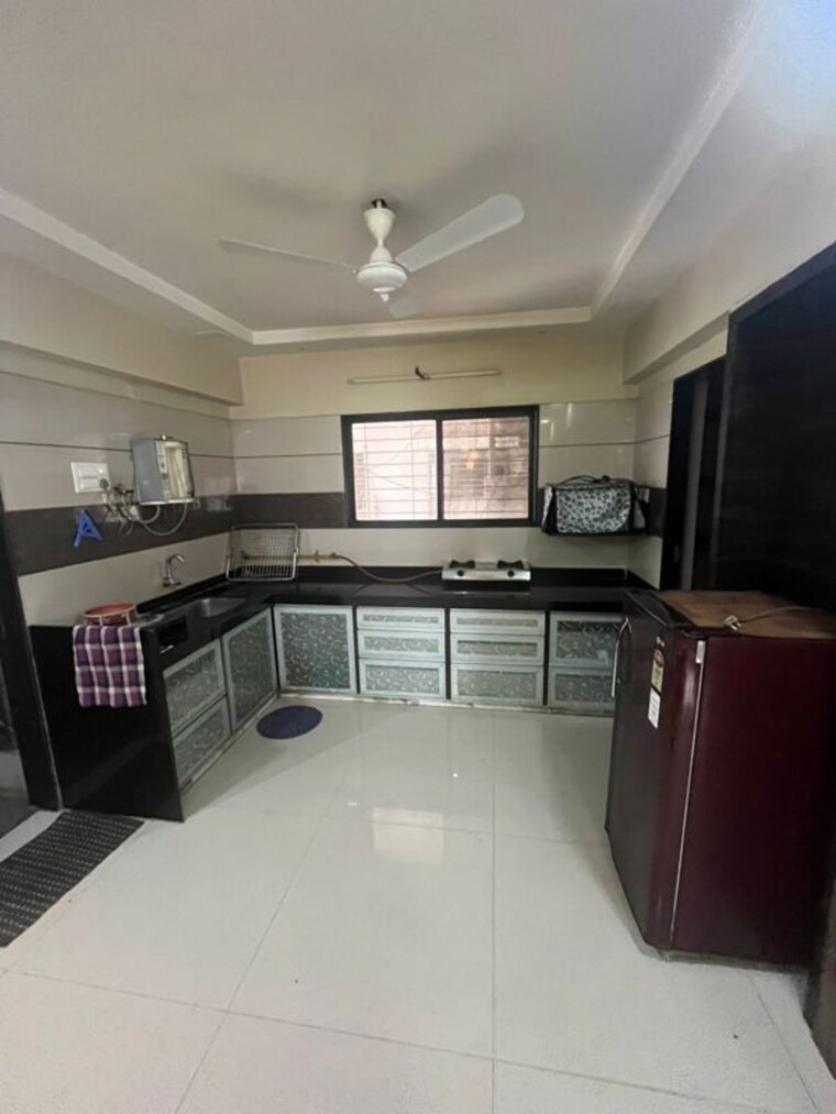 Kitchen, athwa 3 Bedroom 1200 Sq.Ft. Apartment In Athwa Surat 10487590