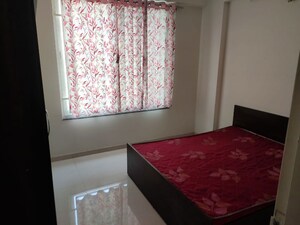 Bedroom in 2 BHK Apartment at Ganga Arcadia, Kharadi – for Rent