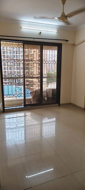 Room in 2 BHK Apartment at Ravechi Heights, Kharghar – for Sale