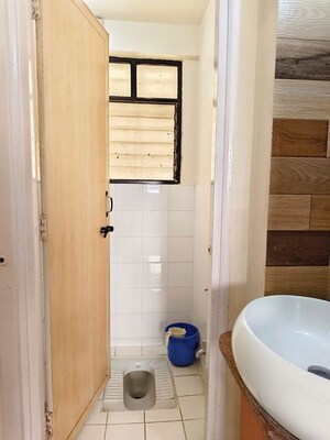 Bathroom in 2 BHK Apartment at Aditya Guruganesh Nagar Phase I, Kothrud – for Rent