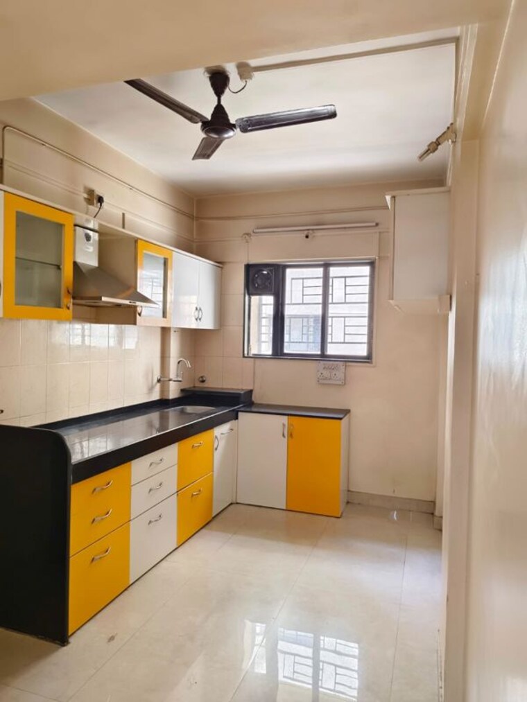Kitchen, aditya-guruganesh-nagar-phase-i 2 Bedroom 1200 Sq.Ft. Apartment In Kothrud Pune 10490361