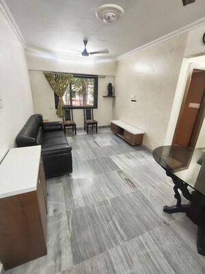 Living Room in 2 BHK Apartment at Crystal Garden Estate CHS, Manpada – for Sale