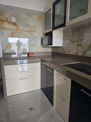 Kitchen in 2 BHK Apartment at Oxy Beaumonde, Viman Nagar – for Rent