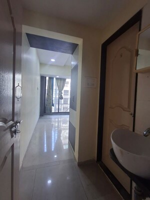 Building Lobby in 2 BHK Apartment at Mahaavir Heritage, Kharghar Sector 35g – for Rent