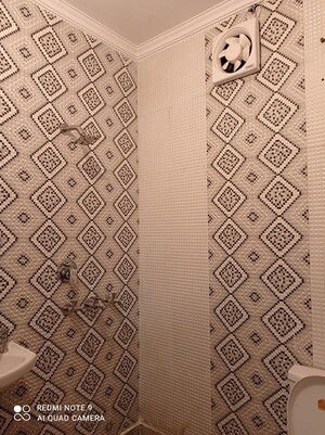 Bathroom in 3 BHK Builder Floor at Tilak Nagar – for Sale