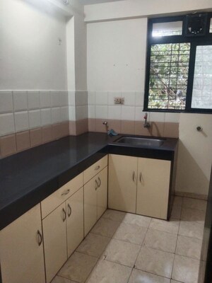 Kitchen in 1 BHK Apartment at Puranik City, Kasarvadavali – for Rent