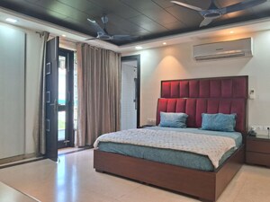 Bedroom in 6 BHK Builder Floor at Nehru Enclave – for Sale