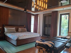 Bedroom in 6 BHK Builder Floor at Nehru Enclave – for Sale