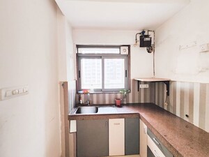 Kitchen in 2 BHK Apartment at Kalpataru Parkcity Sunrise D, Kolshet Road – for Sale