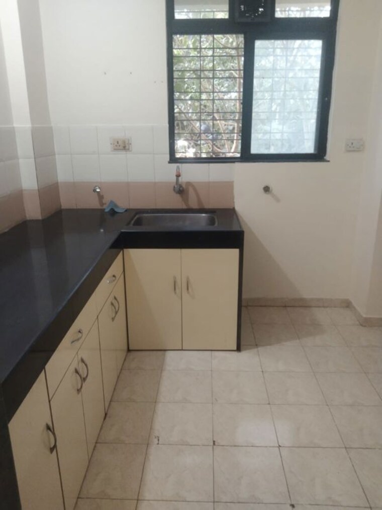 Kitchen, rosa-elite 1 Bedroom 350 Sq.Ft. Apartment In Bhayandarpada Thane 10490644