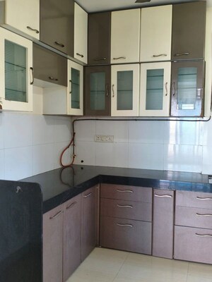 Kitchen in 2 BHK Apartment at Cosmos Classique, Ghodbunder Road – for Rent