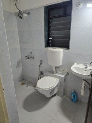 Bathroom in 3 BHK Apartment at Paradigm Zenith Pushpanjali Residency Phase III, Ghodbunder Road – for Rent