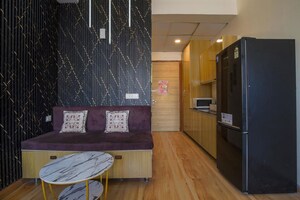 Kitchen in Studio Apartment at Gaur City 2, Sector 16c Greater Noida – for Rent