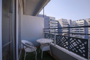 Balcony in Studio Apartment at Gaur City 2, Sector 16c Greater Noida – for Rent