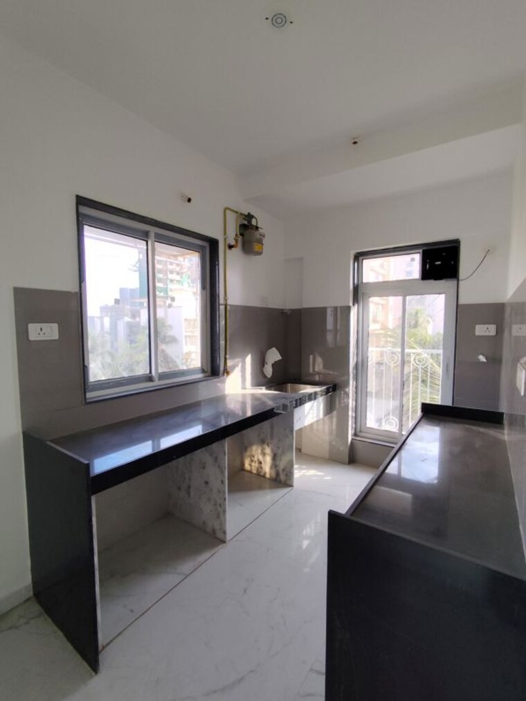 Kitchen, suyojana-residency 2 Bedroom 900 Sq.Ft. Apartment In Goregaon East Mumbai 10490856