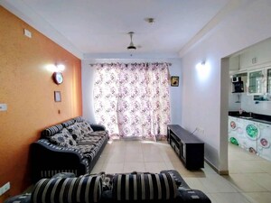 Living Room in 2.5 BHK Apartment at Bhartiya Nikoo Homes, Thanisandra Main Road – for Rent