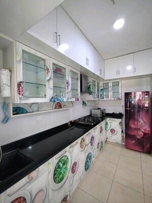 Kitchen in 2.5 BHK Apartment at Bhartiya Nikoo Homes, Thanisandra Main Road – for Rent
