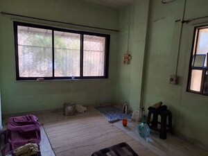Bedroom in 2 BHK Apartment at Neelkanth Pooja CHS, Dombivli East – for Rent