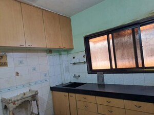 Kitchen in 2 BHK Apartment at Neelkanth Pooja CHS, Dombivli East – for Rent