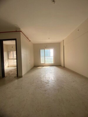 Living Room in 2 BHK Apartment at Dosti West County, Balkum Pada – for Sale