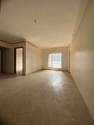 Living Room in 2 BHK Apartment at Dosti West County, Balkum Pada – for Sale