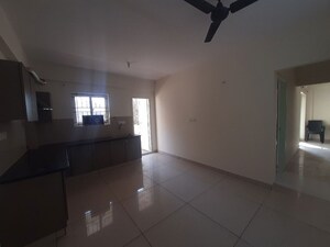 Living Room in 2 BHK Apartment at Sky Gold Elegance, Hebbal – for Rent