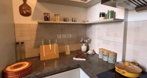 Kitchen in 4 BHK Apartment at Godrej Nest, Sector 150 – for Sale