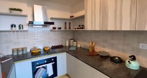 Kitchen in 4 BHK Apartment at Godrej Nest, Sector 150 – for Sale